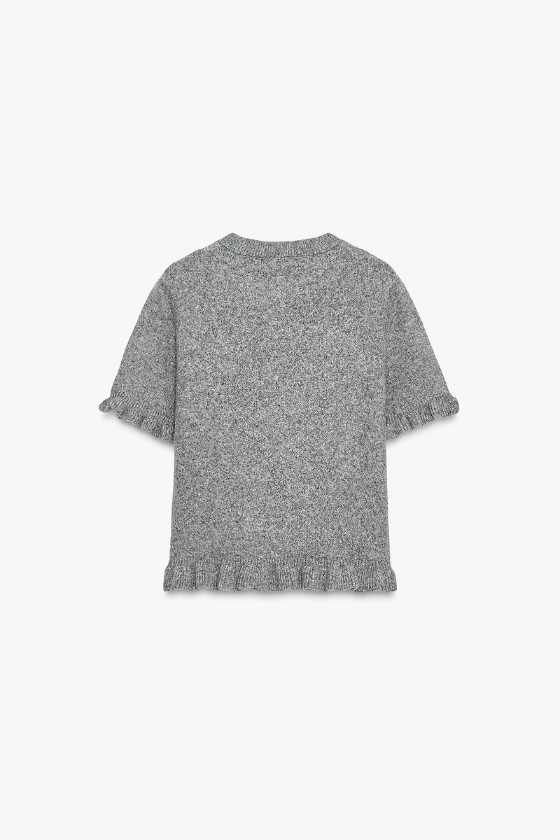 PULL EN MAILLE MANCHES COURTES À VOLANTS