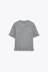 PULL EN MAILLE MANCHES COURTES À VOLANTS