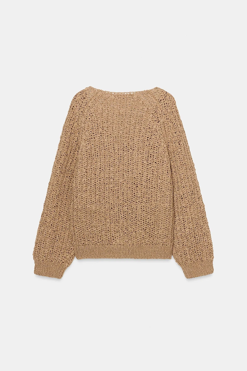 PULL EN MAILLE AVEC BANDE ENTRELACÉE