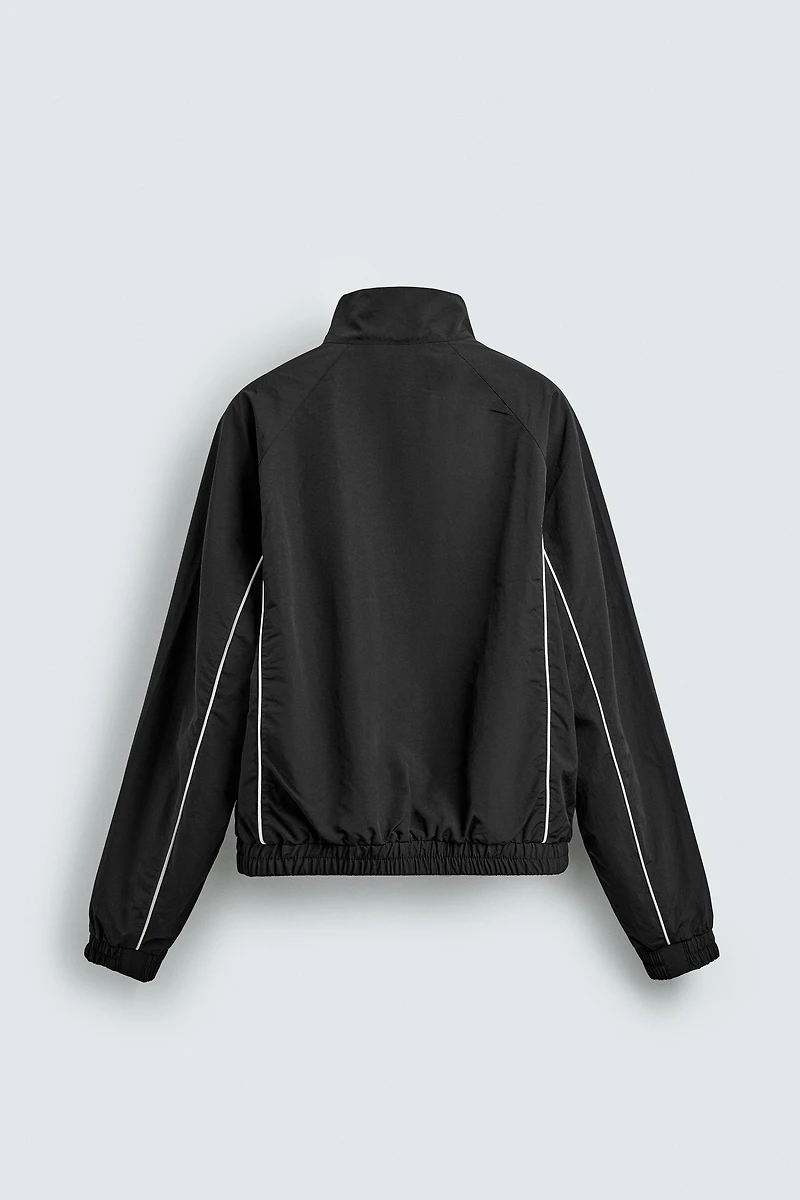 CONTRASTING TECHNICAL JACKET