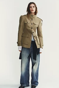 VESTE À POCHES ET PATTES