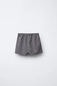 JUPE-SHORT À CARREAUX CŒURS FLOQUÉS
