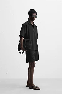 TECHNICAL ZIP POLO SHIRT