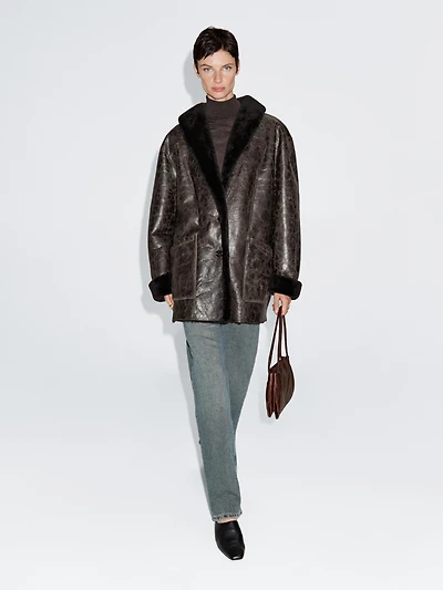 Mouton leather coat with crackled finish