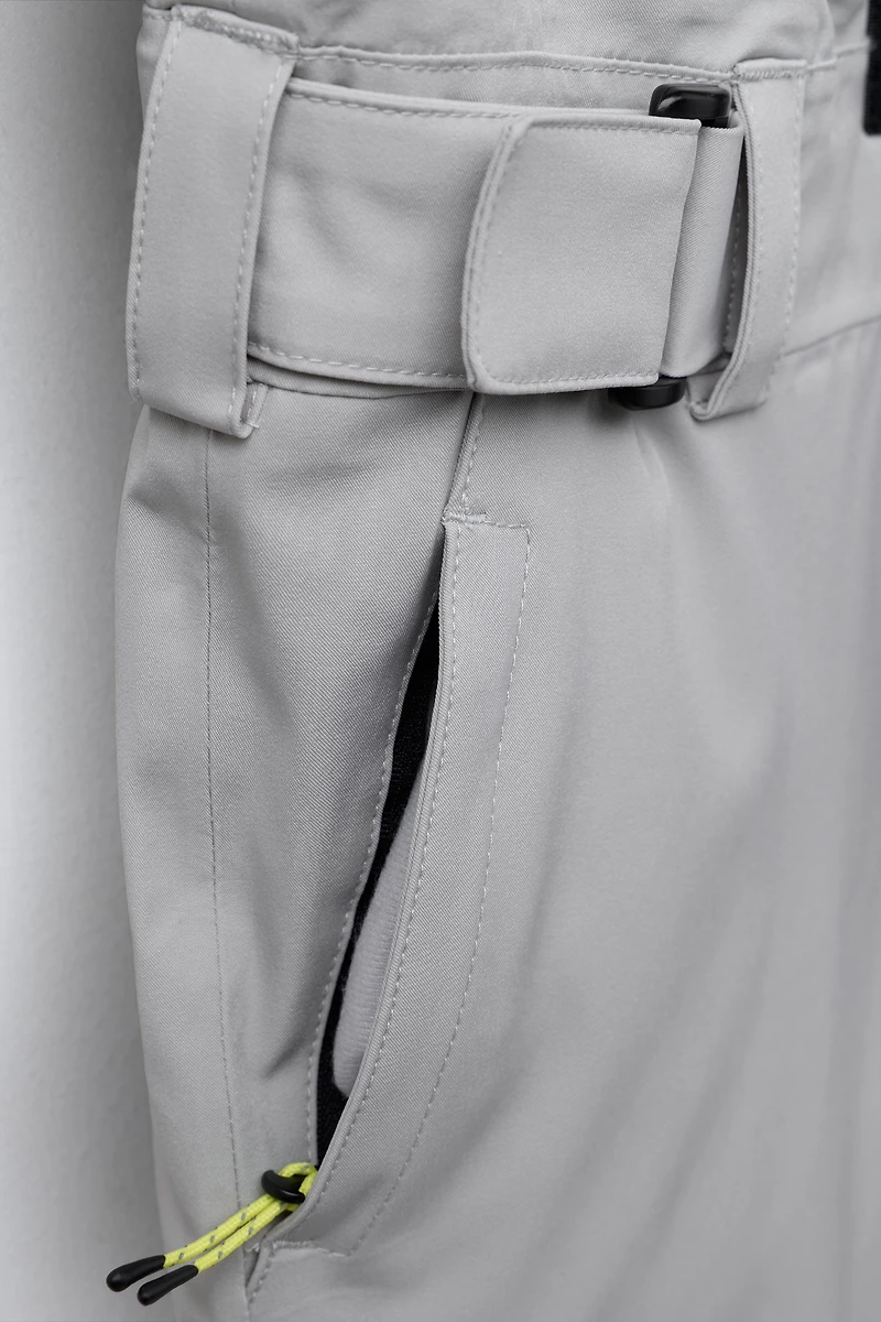 WINDPROOF AND WATER RESISTANT RECCO® SYSTEM SKI COLLECTION JUMPSUIT