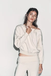 ASYMMETRIC PLUSH SWEATSHIRT