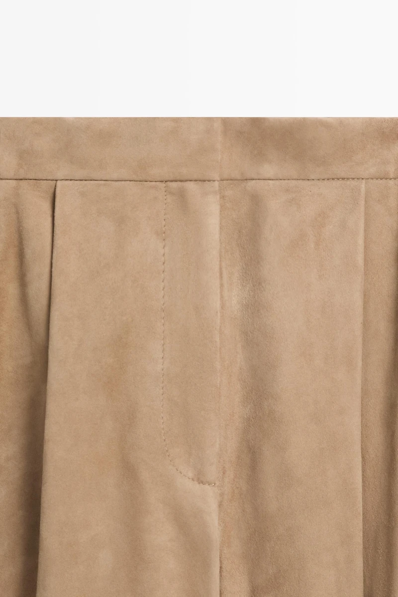 Suede leather pants with tie-detail hems