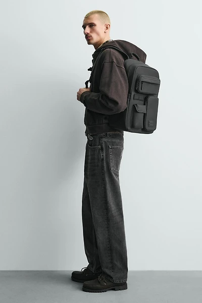 RUBBERIZED MULTI-POCKET BACKPACK