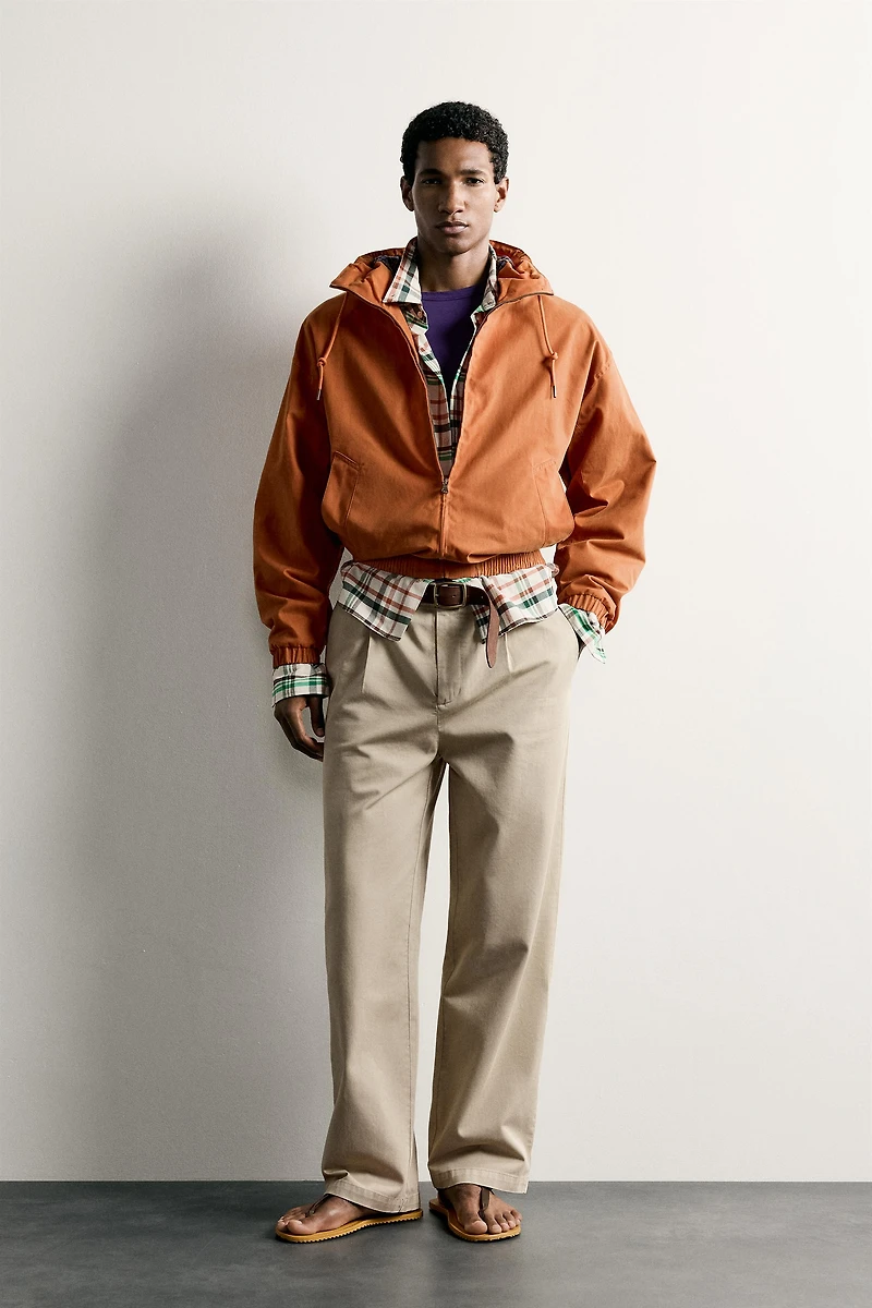 RELAXED FIT PLEATED CHINO PANTS