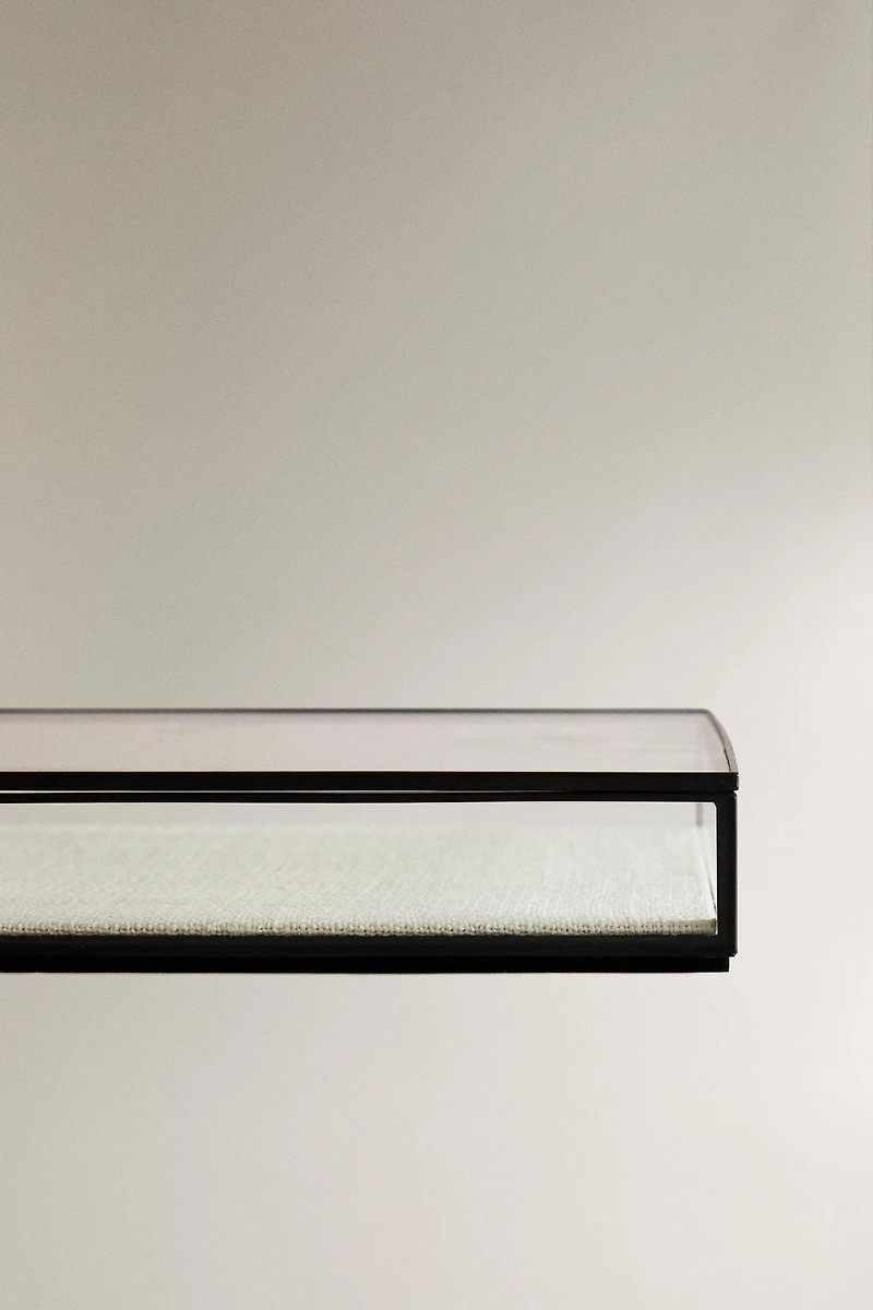 JEWELRY BOX WITH A BLACK METAL BORDER