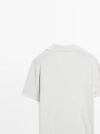 Polo en maille à col V