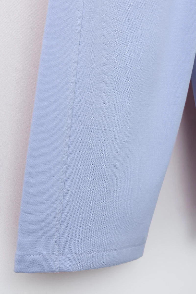 WIDE LEG INTERLOCK RAISED TEXT PANTS
