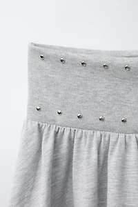 STUDDED RUFFLE SKIRT