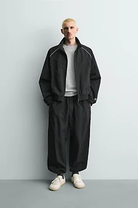 PANTALON JOGGER TECHNIQUE À BANDES CONTRASTE
