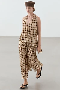 Flowing check print surplice top