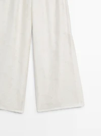 Pantalon élastique fluide détail tissu