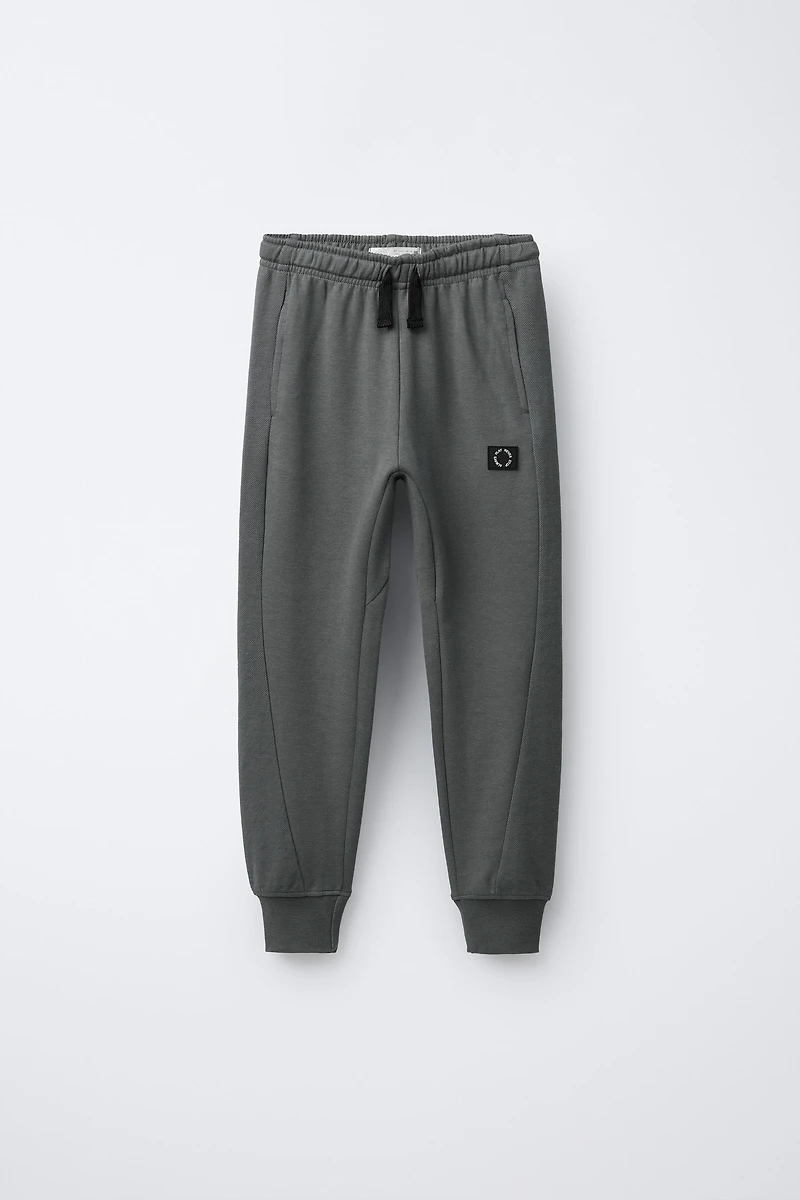 INTERLOCK PIQUÉ JOGGER PANTS