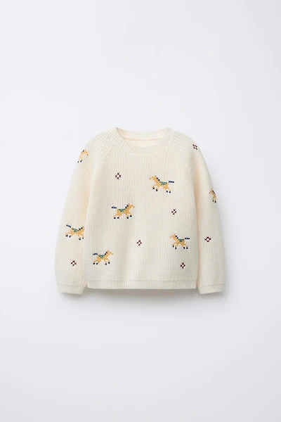 KNIT SWEATER WITH CROSS STITCH DETAILS