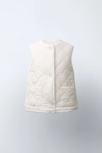 REVERSIBLE FAUX FUR VEST
