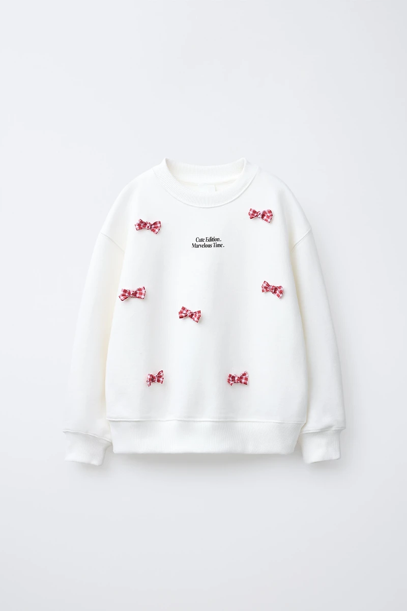 TEXT AND BOWS SWEATSHIRT
