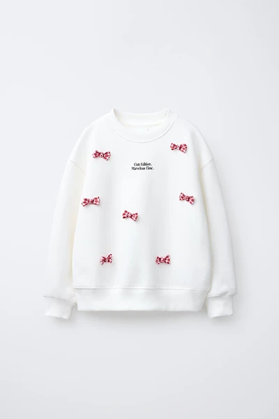 TEXT AND BOWS SWEATSHIRT