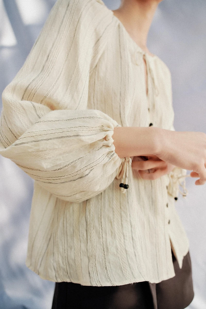 STRIPED BLOUSE WITH BOWS