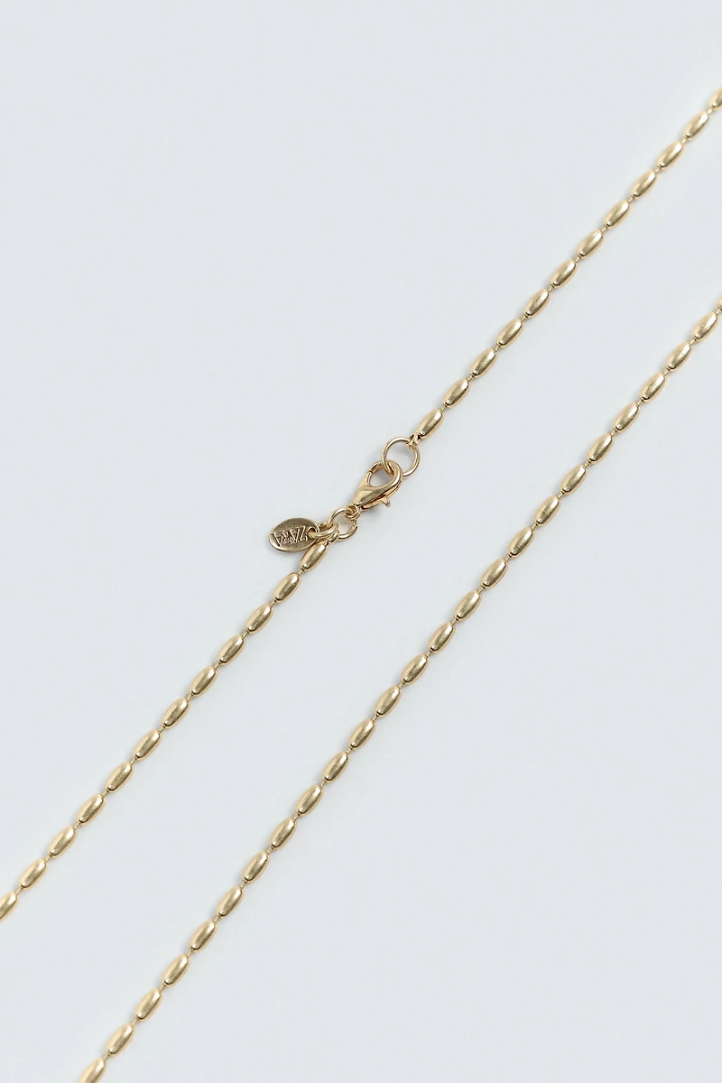 COLLIER À MAILLONS MÉTALLIQUES
