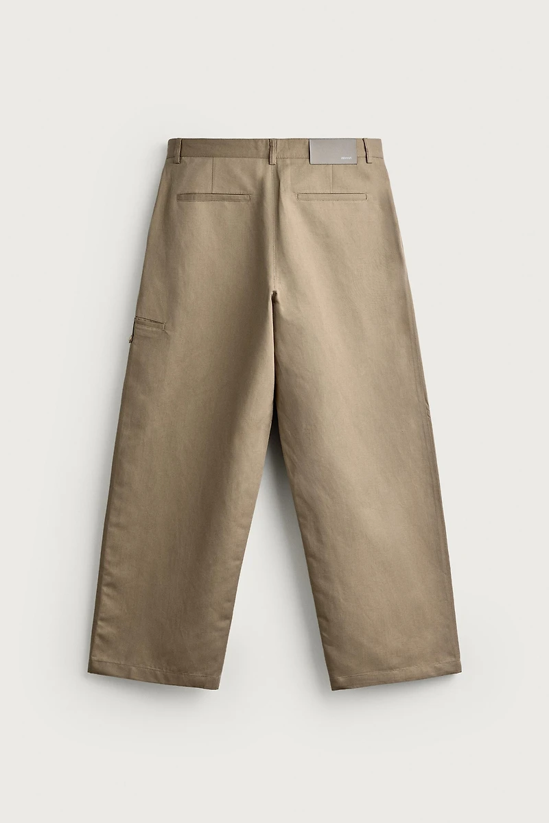 RELAXED FIT PLEATED PANTS
