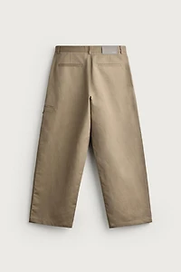 RELAXED FIT PLEATED PANTS