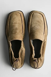 Mocassins en cuir souple froncés