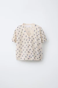 TOP EN MAILLE À FLEURS