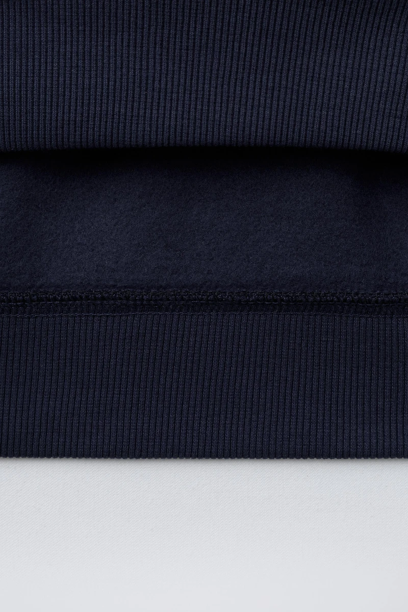 TEXT AND LABEL SWEATSHIRT