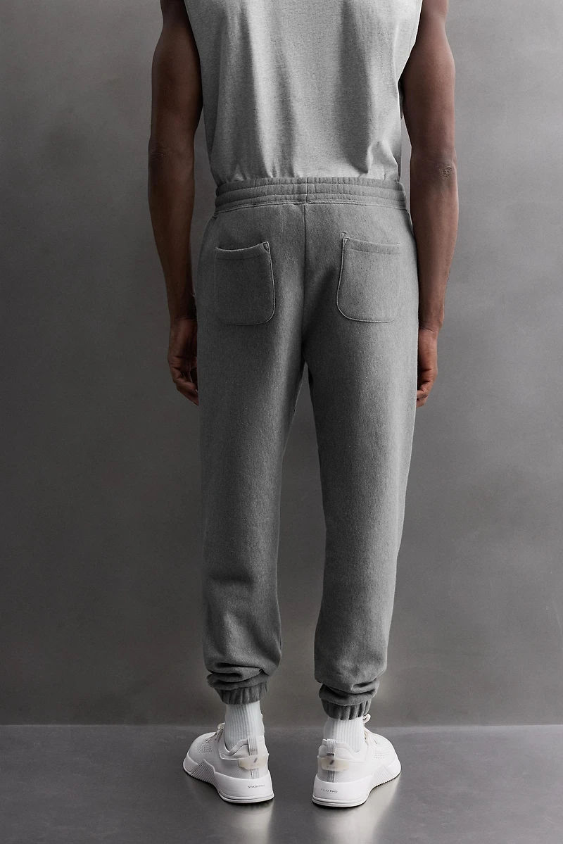 JOGGING PANTS WITH PRINTED TEXT
