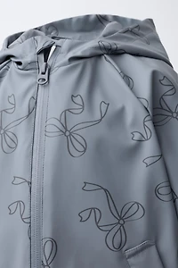 CIRÉ GOMMÉ IMPRIMÉ WATER RESISTANT