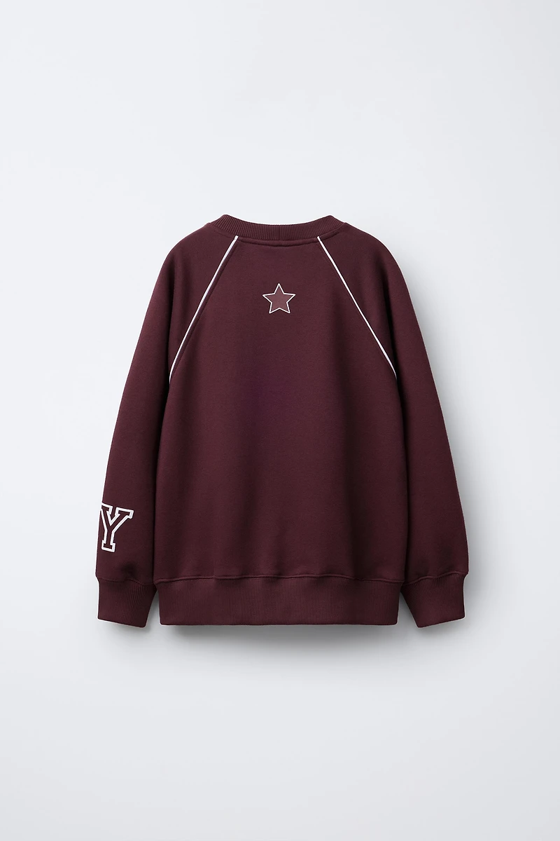 RAGLAN SLEEVE SWEATSHIRT WITH TEXT AND NUMBER