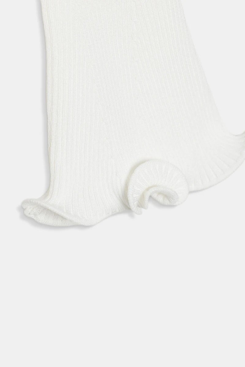 GILET EN MAILLE CÔTELÉE À FINITIONS ONDULÉES