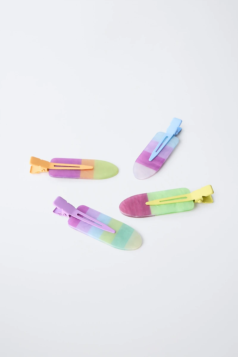 FOUR-PACK OF MULTI-COLORED BARRETTES