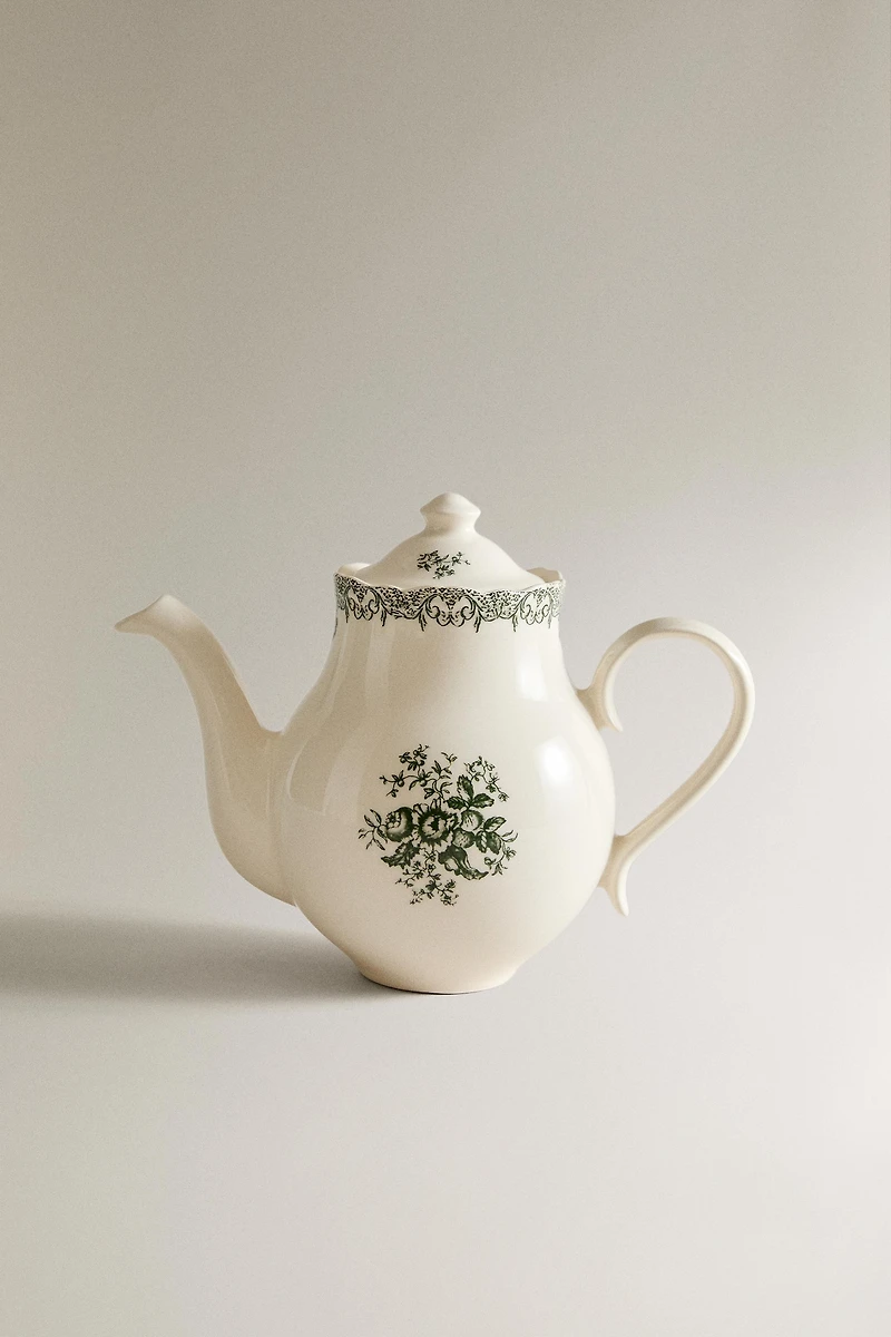 THÉIÈRE EN FAÏENCE À MOTIF FLORAL