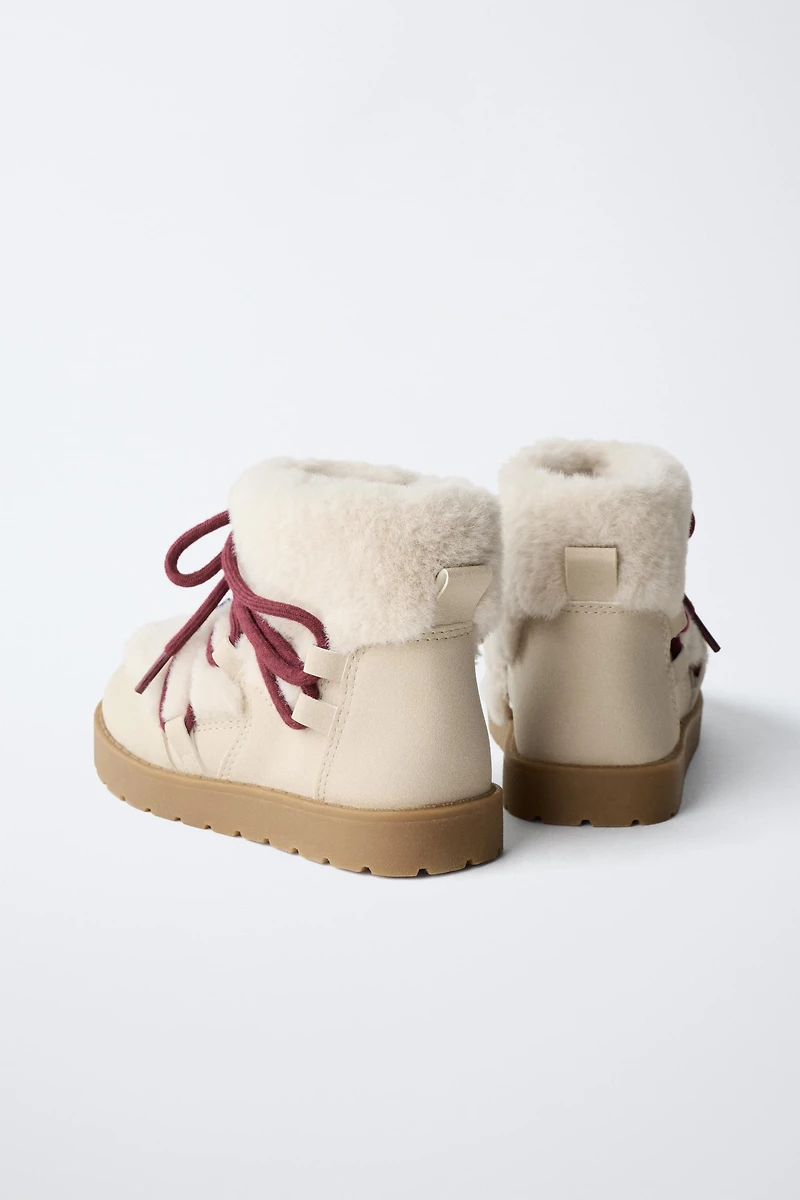 BEADED FUR-LINED BOOTS