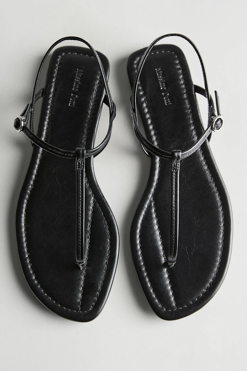 Strappy flat sandals with toe divider