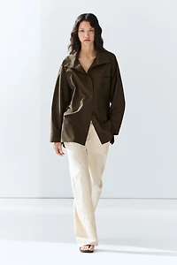 High collar overshirt with buckle detail