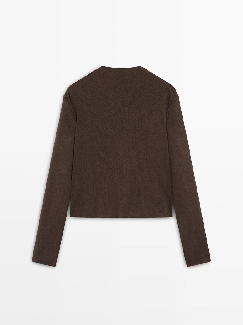 Pull à col montant en maille de laine mélangée