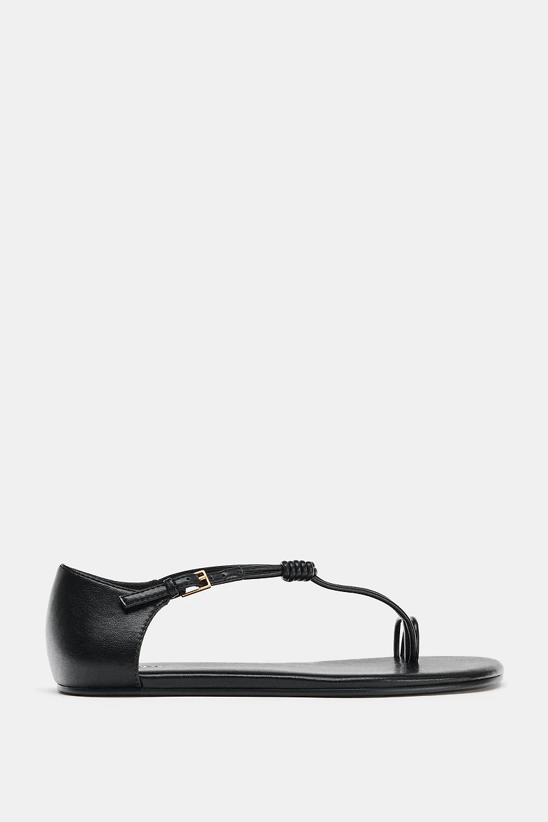 FLAT SANDALS WITH KNOTTED TOE STRAP