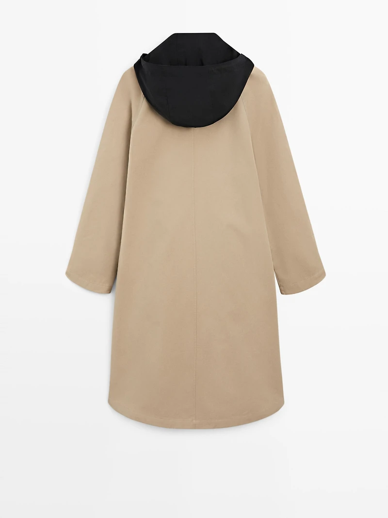 Cape trench coat with detachable hood