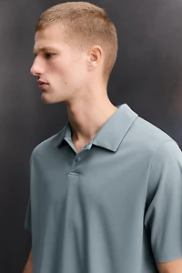 TECHNICAL PIQUÉ TRAINING POLO