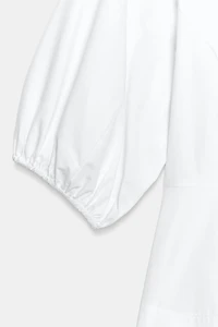 PEPLUM SHIRT WITH PUFF SLEEVES