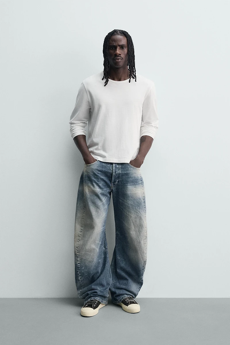 BARREL FIT JEANS WITH TWISTED SEAMS