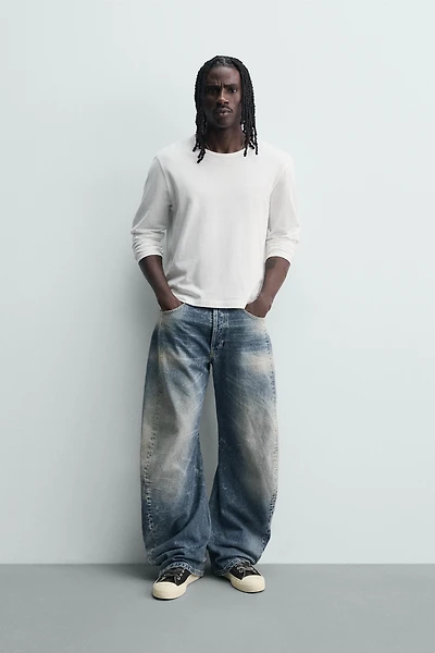 BARREL FIT JEANS WITH TWISTED SEAMS