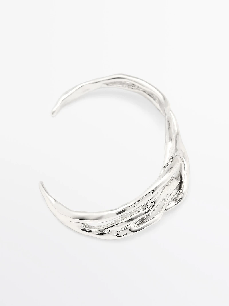 Bracelet métallique abstrait