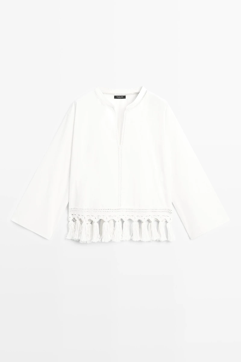 Embroidered blouse with fringed hem